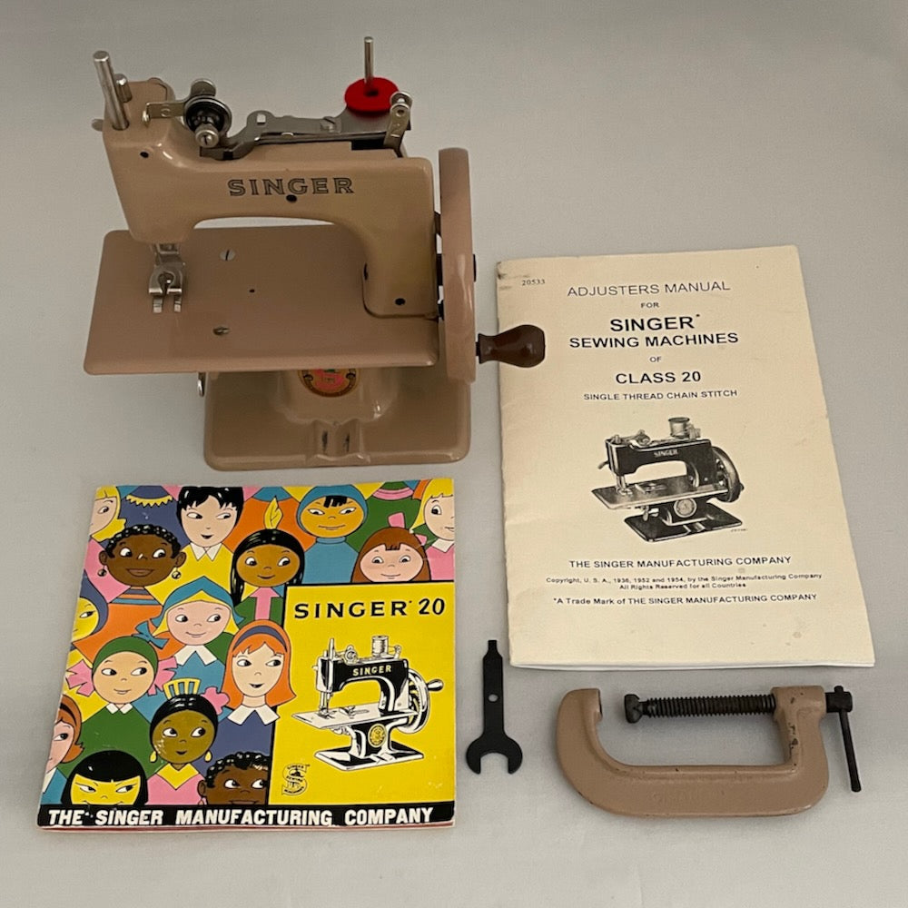 British red S Singer 20 toy sewing machine.